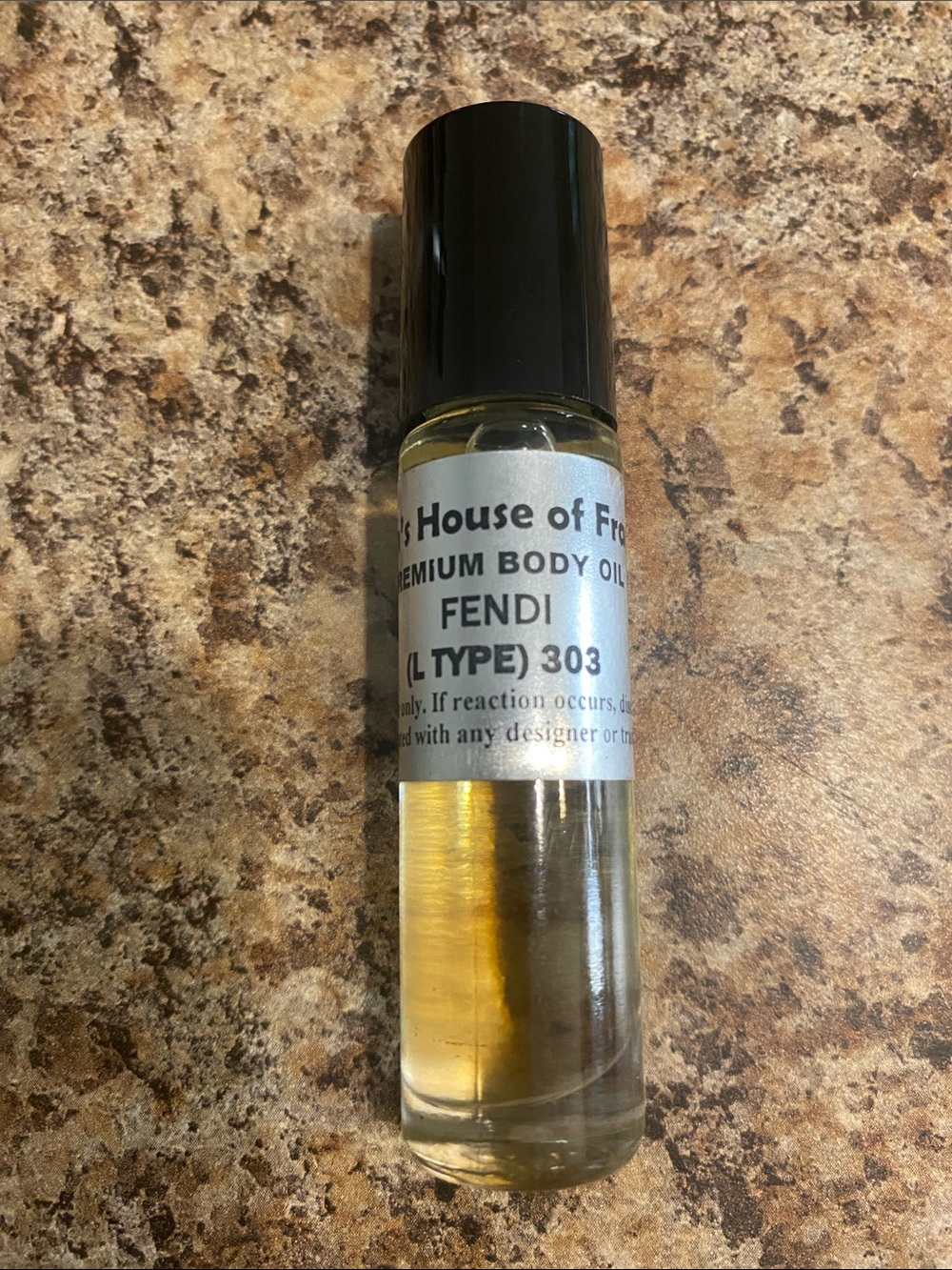 Fendi Roll-On Body Oil — Black Cap with Golden Yellow Oil